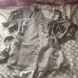 Black and white striped blouse.